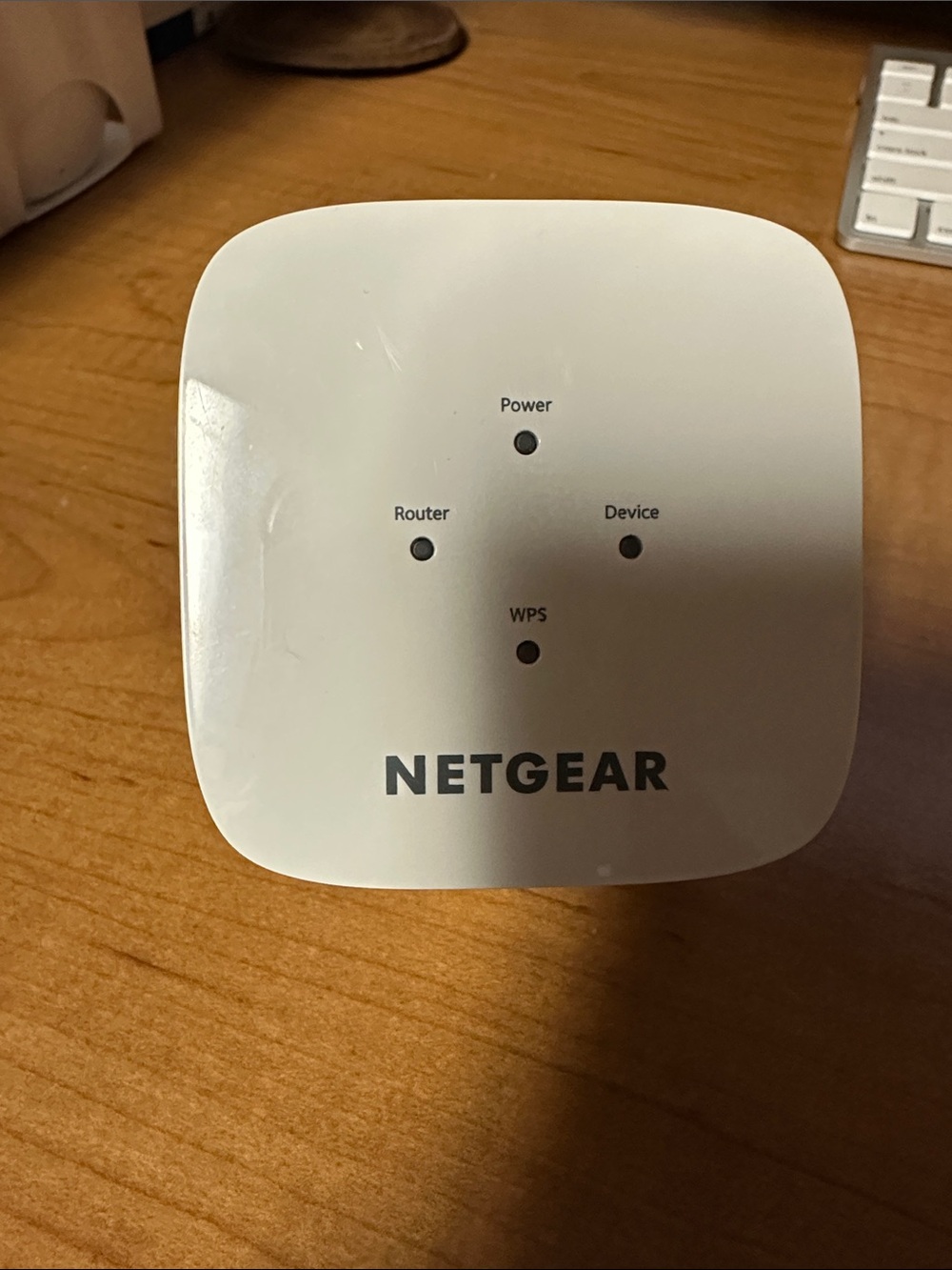 netgear white WiFi Range Extender with Status LEDs